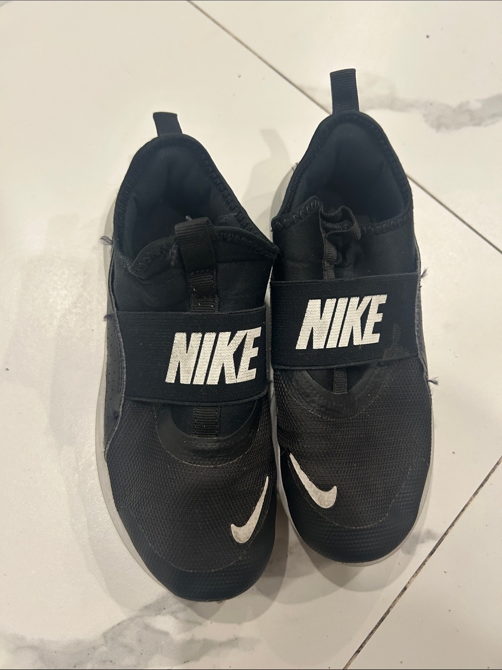 Nike Kids Black Slip-On Sneakers with White Swoosh